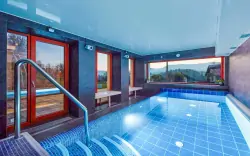 Jeseníky: Hotel Slunný dvůr *** se snídaní nebo polopenzí a vstupem do wellness + zábaly a hořčíková lázeň