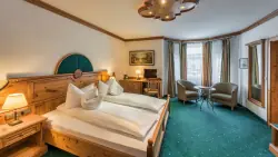 Rooms, Hotel Unterwirt ****superior, Chiemgau, Németország