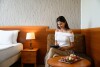 Žena v hotelovém pokoji, Hotel Narád ****, Mátraszentimre, Mátra, Maďarsko